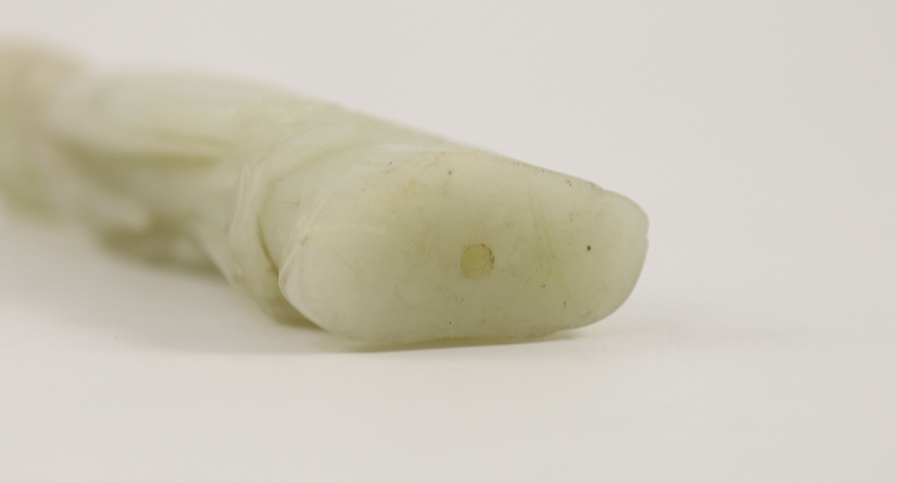 A Chinese pale celadon jade figure of a lady, 18th century